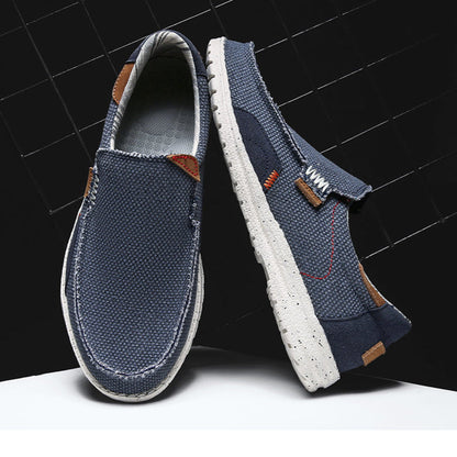 Side view of men's lightweight slip-on loafers, showcasing breathable fabric & casual everyday style.