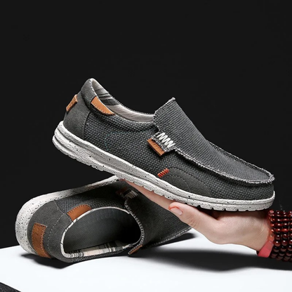 Breathable fabric men's slip-on loafers, lightweight and comfortable for casual everyday summer footwear.
