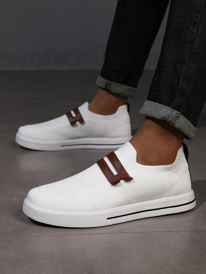 Slip-on mesh loafers for men, offering breathable, lightweight comfort and easy wear.