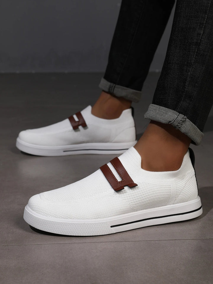 Slip-on mesh loafers for men, offering breathable, lightweight comfort and easy wear.