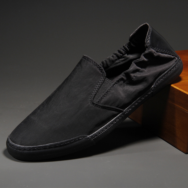 Comfortable men's travel shoes. Lightweight slip-on design for easy wear & all-day support.