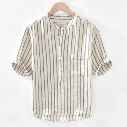 Close-up of a men's striped linen blend popover henley shirt, showcasing its lightweight and breathable fabric.