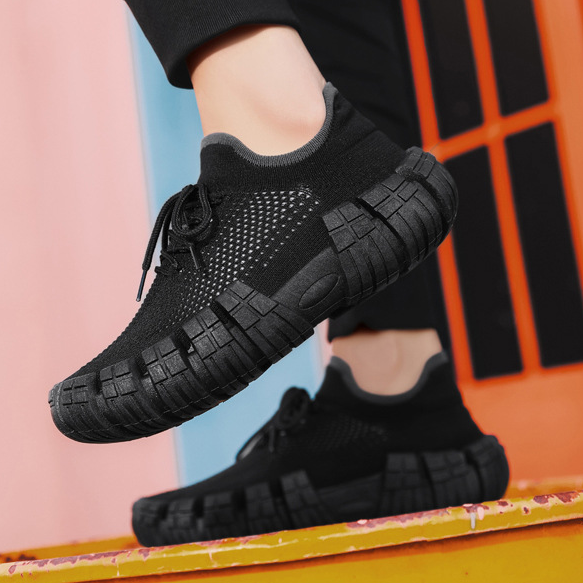 Urban-inspired men's athletic shoes, breathable and lightweight for optimal city performance.