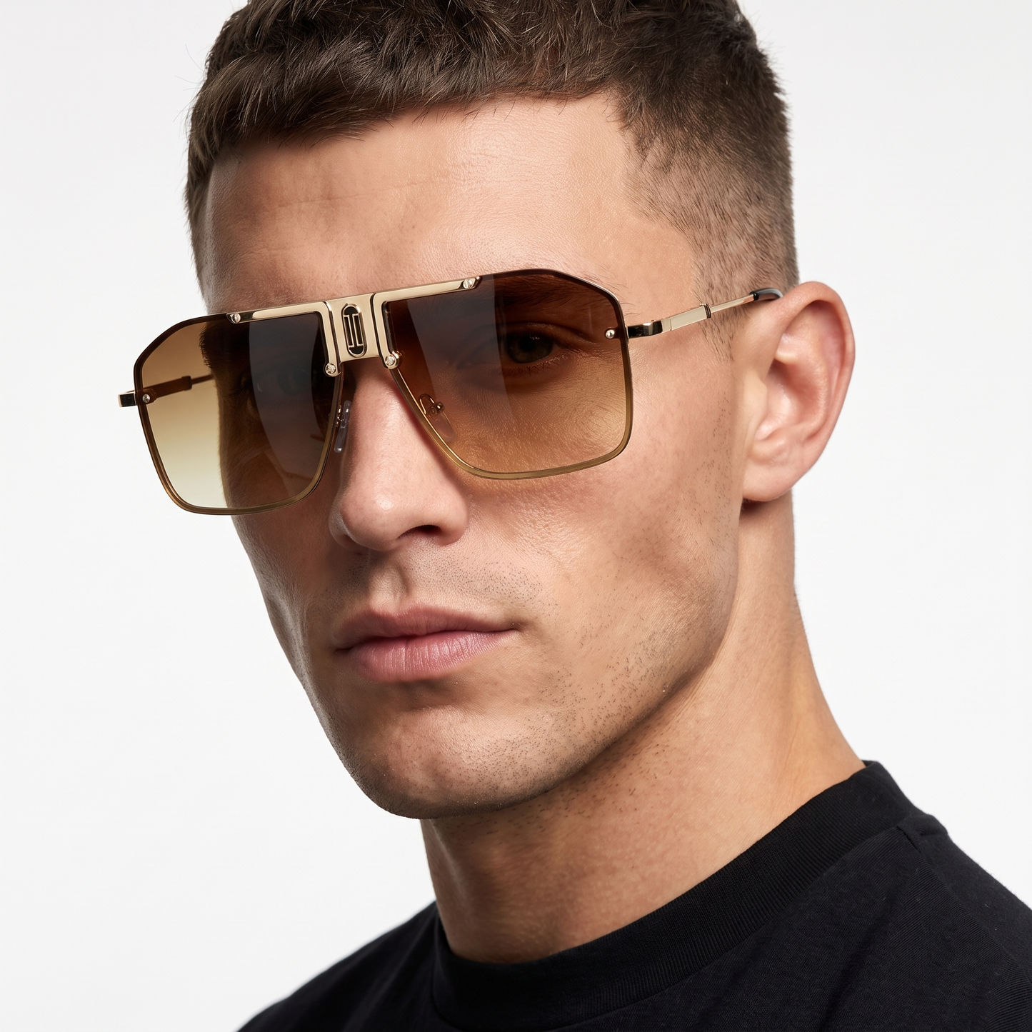 Modern men's fashion sunglasses, lightweight and frameless, offering essential UV400 protection.