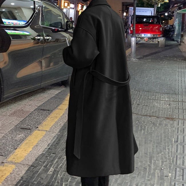 Elegant black men's belted trench coat, a timeless long overcoat for formal wear and smart casual outfits.