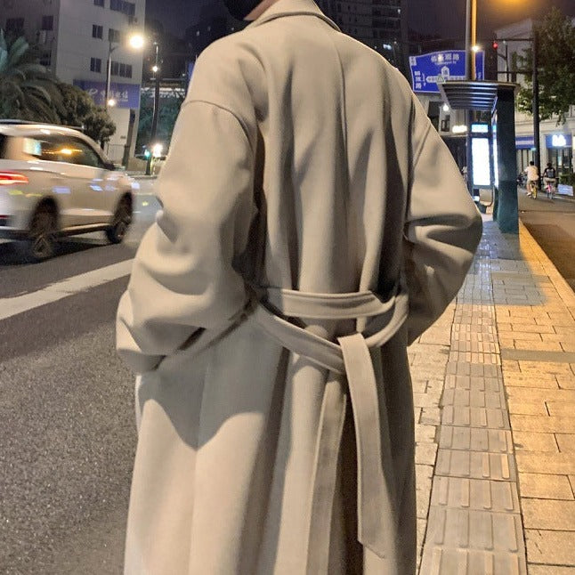 Classic men's khaki long belted overcoat, a sophisticated trench coat for autumn fashion & winter outerwear.