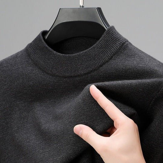 Men's fashionable mock neck pullover, a comfortable and versatile long-sleeve sweater for any casual occasion.
