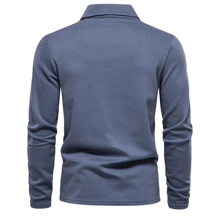 Stylish men's long-sleeve polo shirt, features a turn-down collar & embroidered detail.