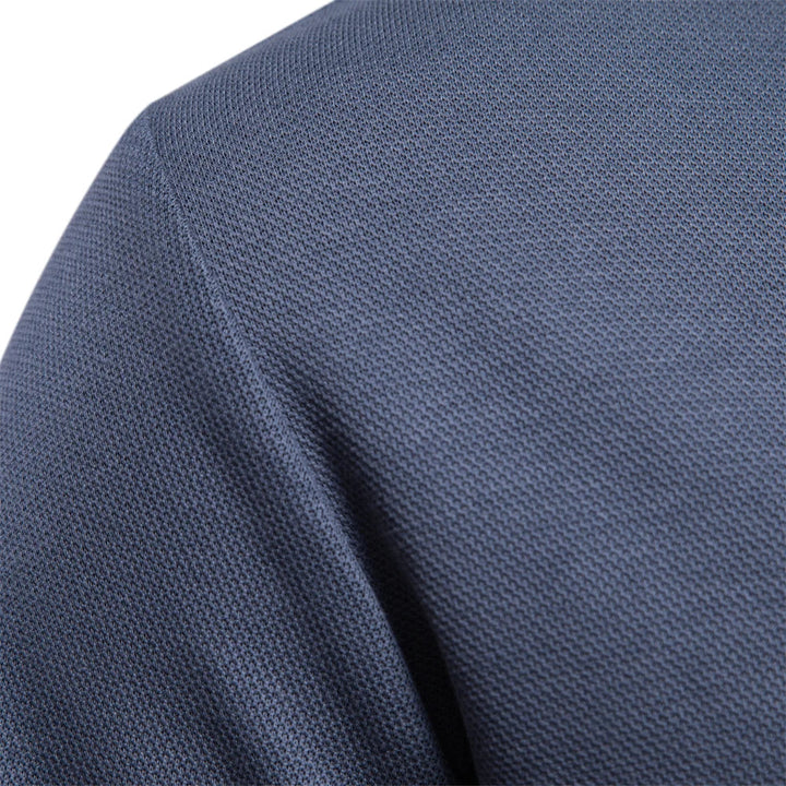 Casual men's long-sleeve polo with a sophisticated turn-down collar, perfect for daily fashion.