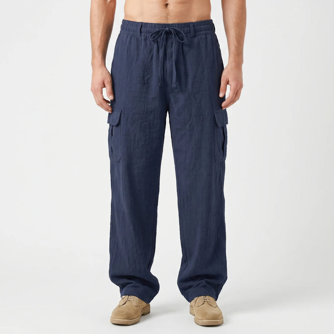 Men's loose fit cargo pants featuring practical utility pockets, great for travel and outdoor activities.