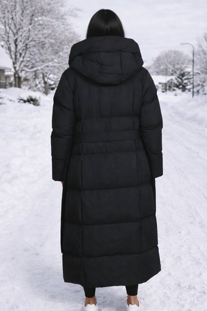 Stylish men's longline puffer jacket, hooded and insulated for superior winter warmth and outerwear comfort.