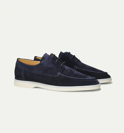 Black men's fashion loafers with lace-up detail, offering refined style for both formal and casual outfits.