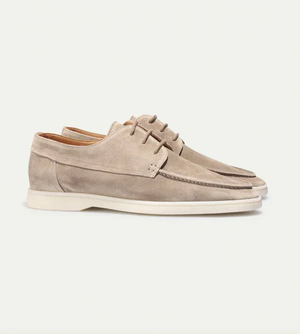 High-quality beige men's lace-up dress shoes, versatile for office or smart casual events. Luxury footwear.