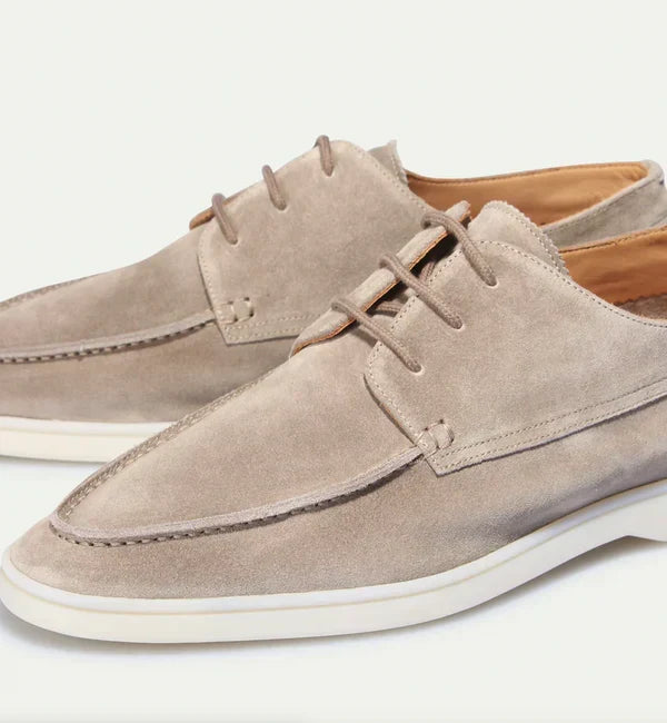 Stylish black lace-up loafers for men, ideal for adding a sophisticated touch to any formal or casual look.