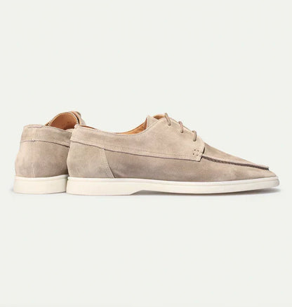 Premium men's beige loafers with lace-up closure, designed for luxurious comfort and versatile everyday wear.