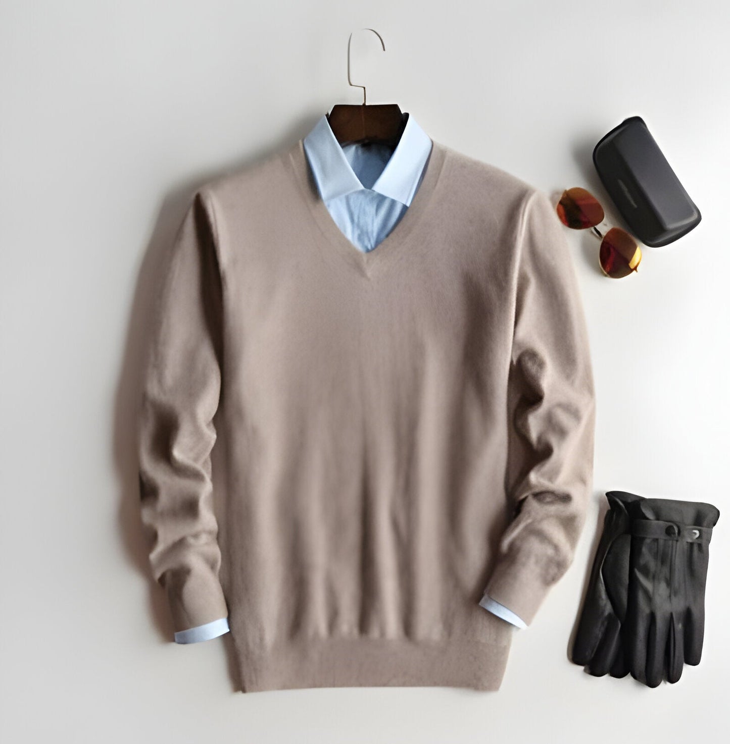 Modern men's luxury V-neck cashmere pullover, elegant long sleeve sweater for versatile fall and winter fashion.