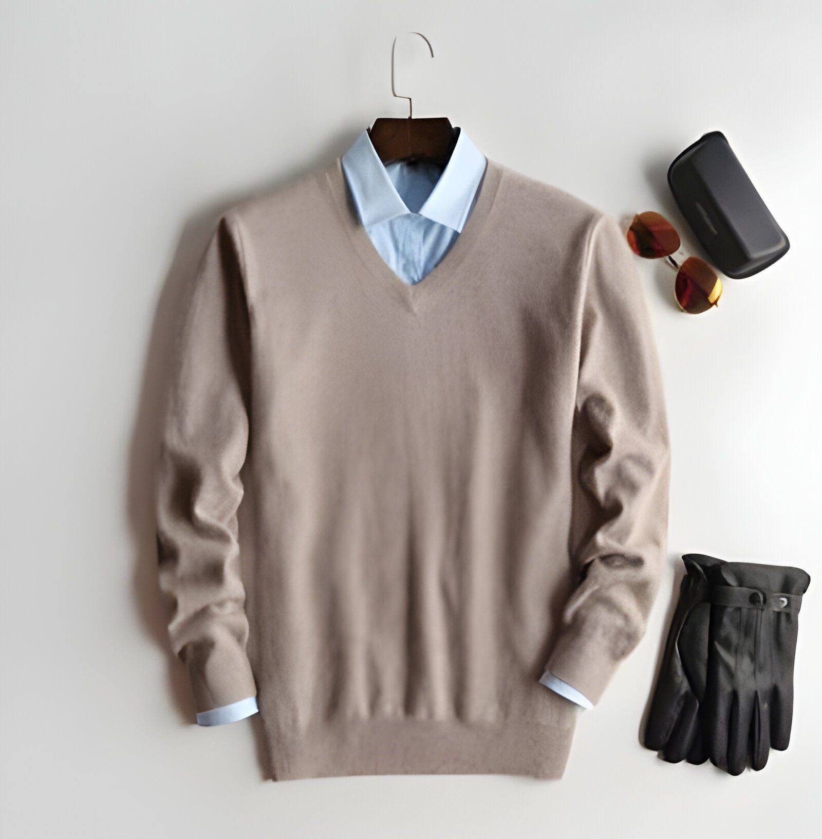 Modern men's luxury V-neck cashmere pullover, elegant long sleeve sweater for versatile fall and winter fashion.
