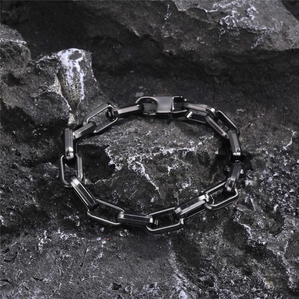 Detailed shot of a men's luxury chain link bracelet, highlighting the premium finish and strong design.