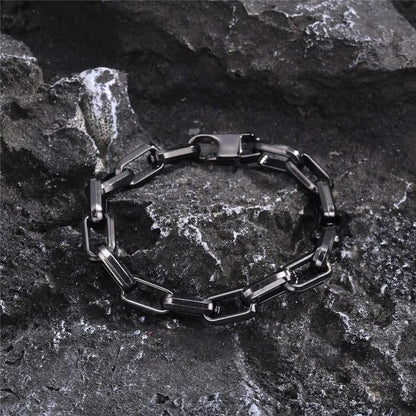 Detailed shot of a men's luxury chain link bracelet, highlighting the premium finish and strong design.