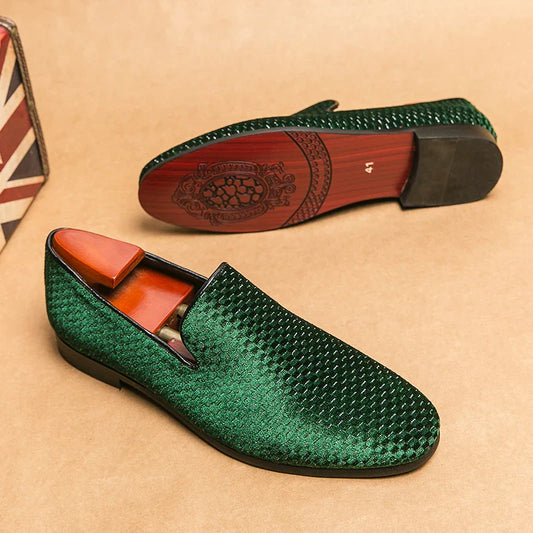 Men's luxury slip-on loafers in black leather, perfect for formal and casual stylish outfits.