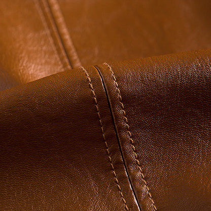 Luxury men's tailored jacket interior with premium lining and detailed stitching, showcasing quality.
