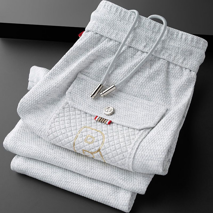 Comfortable men's tapered fit joggers, ideal for casual wear, lounging, or light athletic activity.
