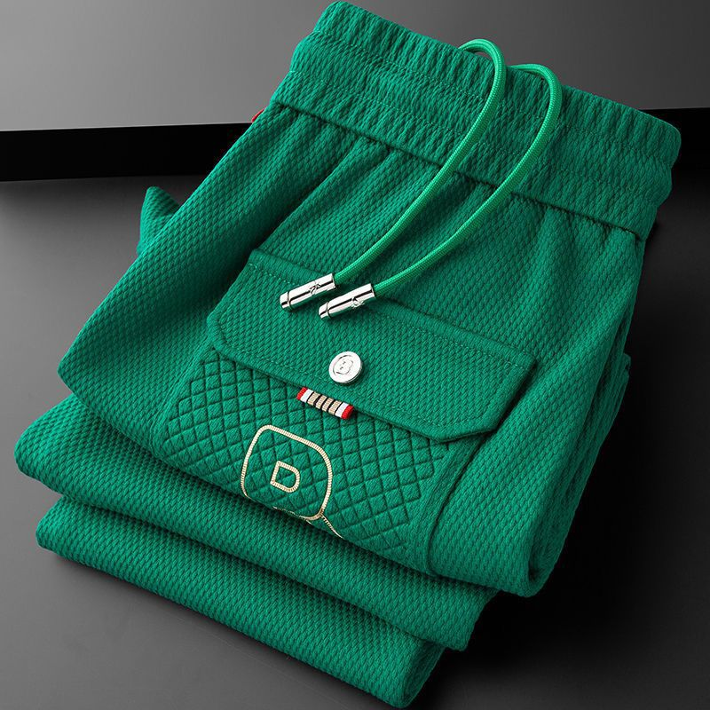 Stylish men's luxury joggers with a modern tapered fit, enhancing men's fashion and activewear.