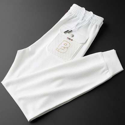 Luxury men's tapered joggers, blending style, comfort, and a modern fit for any casual occasion.