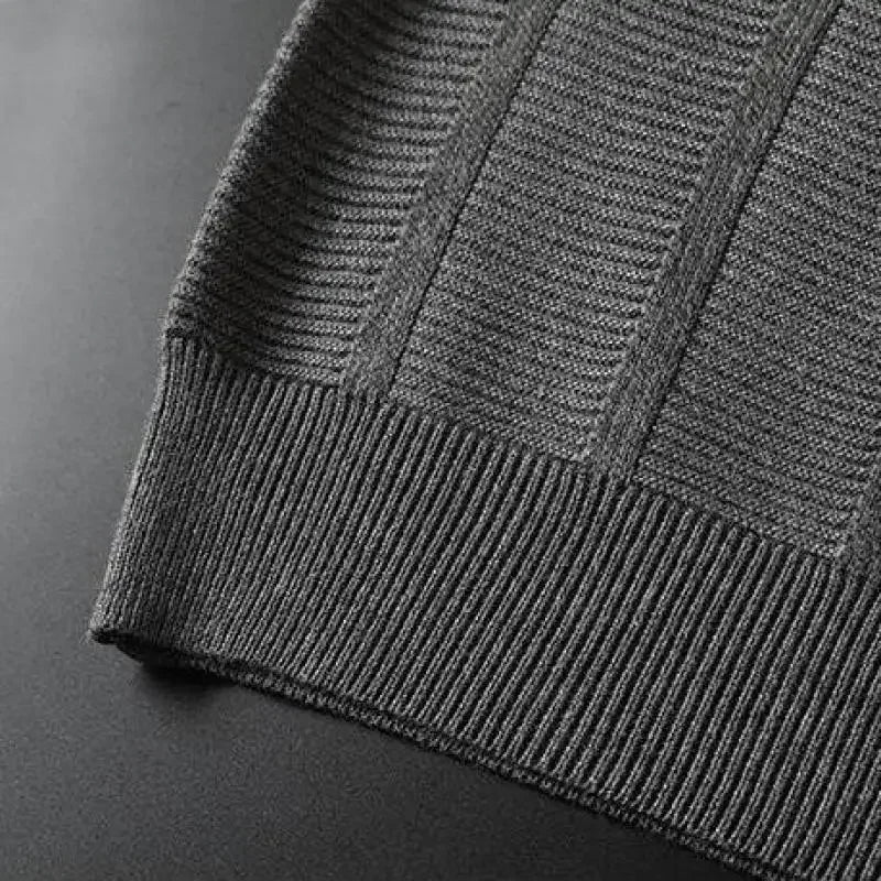 Close-up of a men's luxury textured knit polo shirt, highlighting the unique breathable fabric and knit pattern.
