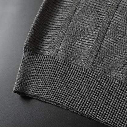 Close-up of a men's luxury textured knit polo shirt, highlighting the unique breathable fabric and knit pattern.