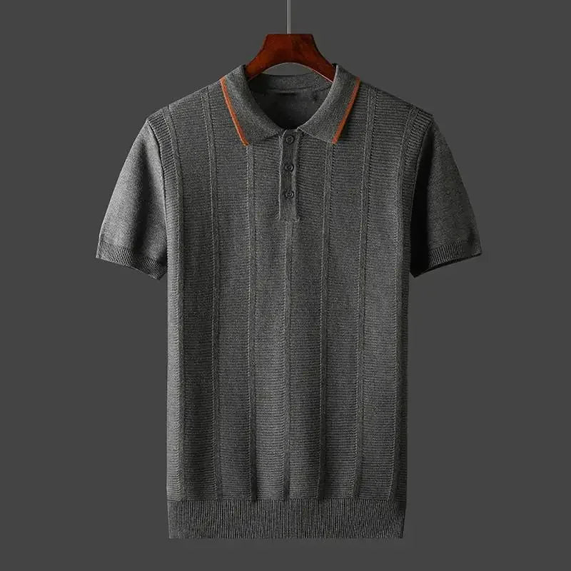 Stylish man wearing a versatile short-sleeve textured knit polo shirt, perfect for casual or smart casual outfits.