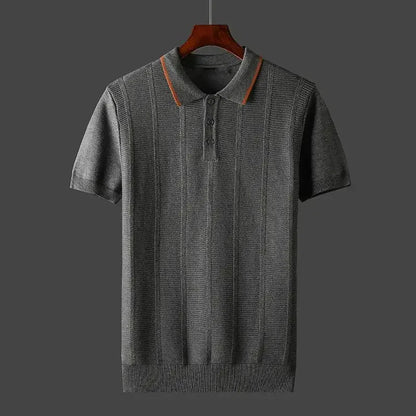 Stylish man wearing a versatile short-sleeve textured knit polo shirt, perfect for casual or smart casual outfits.