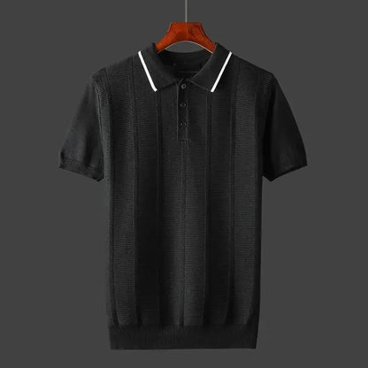 Detail of the collar and buttons on a men's luxury textured knit polo shirt, showcasing refined design.