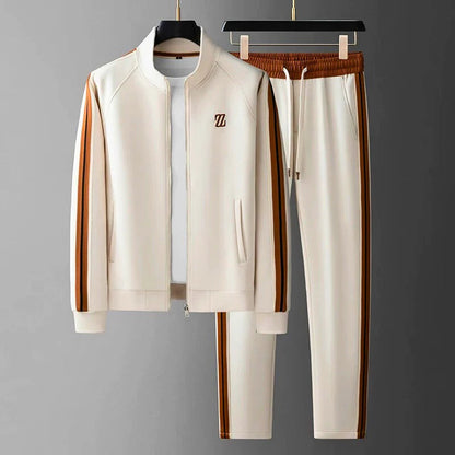 Stylish Men's Manor two-piece tracksuit. Features a zip-up jacket & matching trousers for comfortable athleisure fashion.