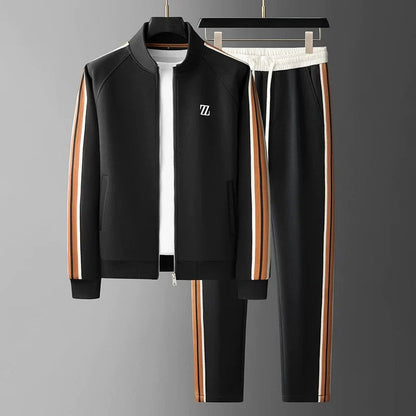 Men's Manor athleisure tracksuit featuring a modern zip-up jacket & comfortable trousers. Ideal for active lifestyles.