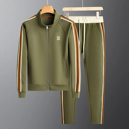 Fashionable men's tracksuit set. Includes a stylish zip-up jacket & soft trousers for sportswear & casual comfort.
