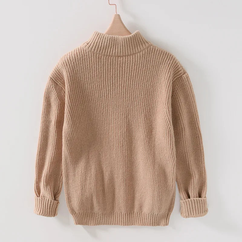 Close-up of a men's Marbella sweater, highlighting its soft, cozy texture for warmth and comfort in winter fashion.