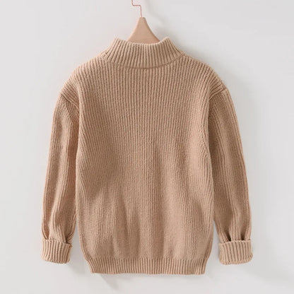 Close-up of a men's Marbella sweater, highlighting its soft, cozy texture for warmth and comfort in winter fashion.