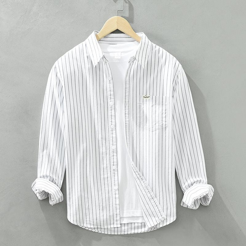 Breathable men's striped button-up shirt, ideal for comfortable casual summer fashion.