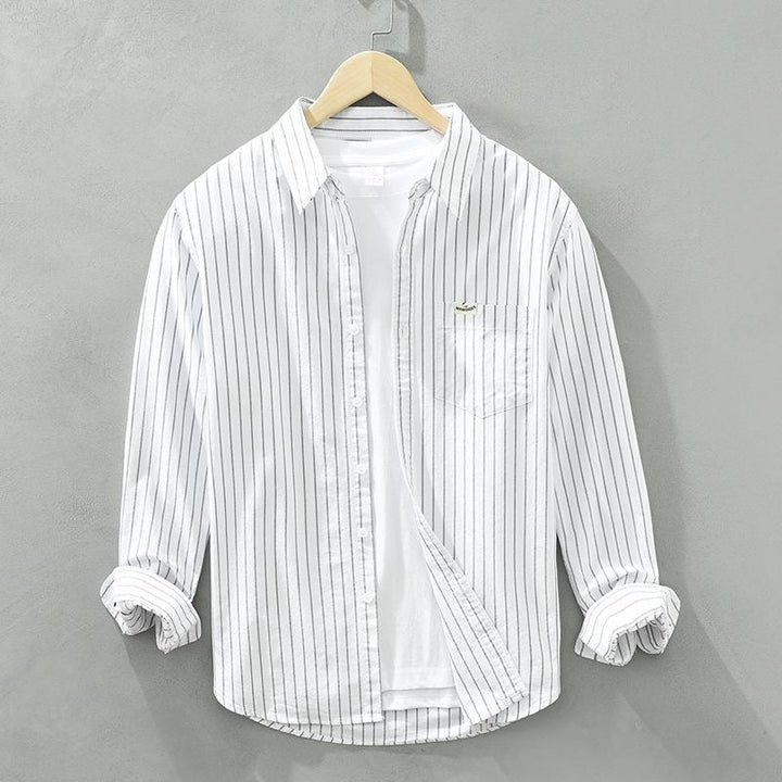 Breathable men's striped button-up shirt, ideal for comfortable casual summer fashion.