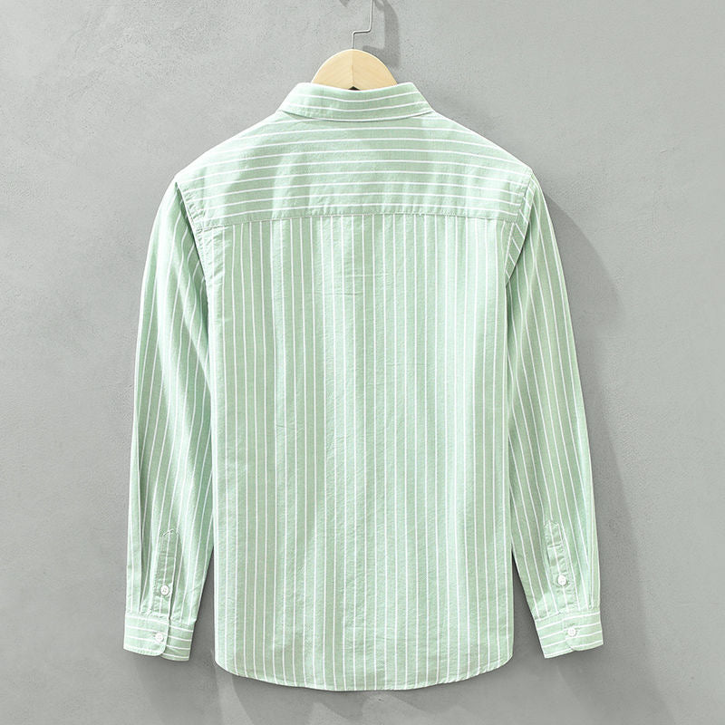 Casual men's striped button-up shirt, perfect for a relaxed yet modern summer style.