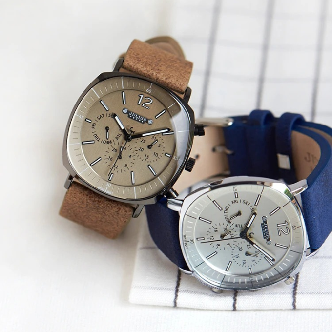 Back view of Mason Edge men's classic wristwatch, highlighting stainless steel case and engraved logo.