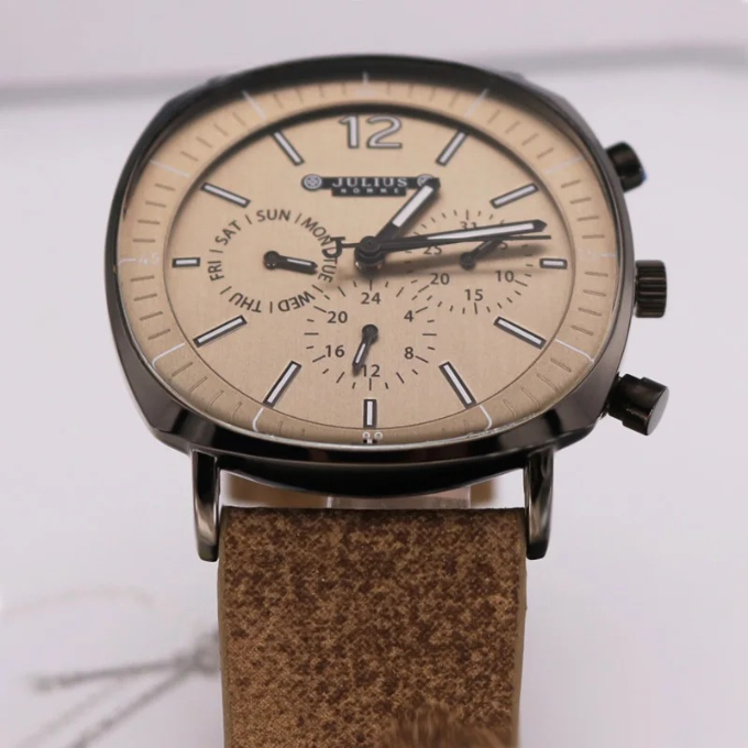 Mason Edge men's accessory: a stylish and scratch-resistant executive wristwatch on a desk.