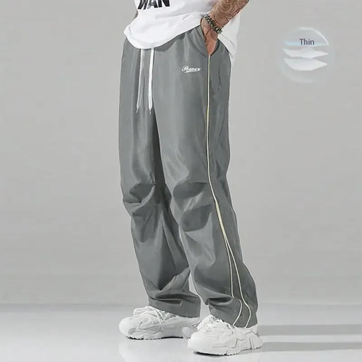 Stylish men's Matera track pants, ideal for sportswear, loungewear, or everyday comfort with a relaxed fit.