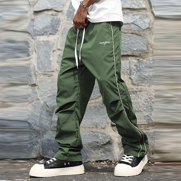 Versatile Matera men's track pants offer tailored comfort & sharp style for athletic, casual or loungewear.