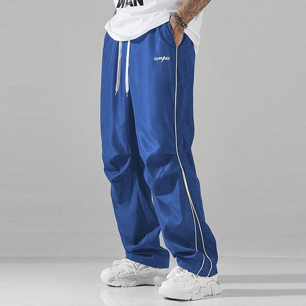 Sharp style Matera men's track pants with a relaxed fit, perfect for modern athletic wear & casual fashion.