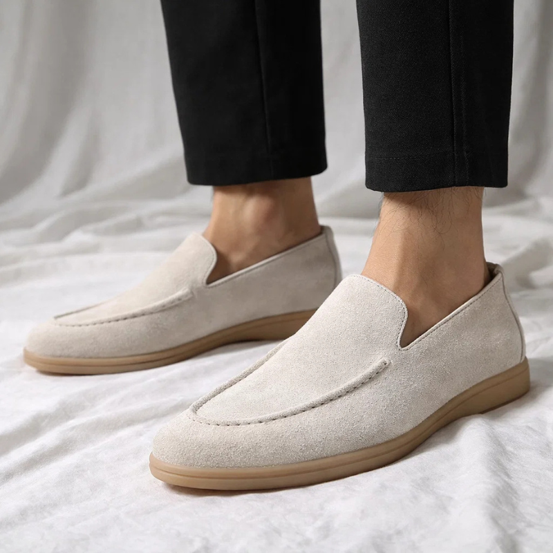 Versatile black men's Mayfair slip-on loafers, perfect dress shoes for formal or casual outfits.