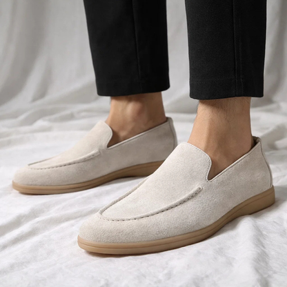 Versatile black men's Mayfair slip-on loafers, perfect dress shoes for formal or casual outfits.
