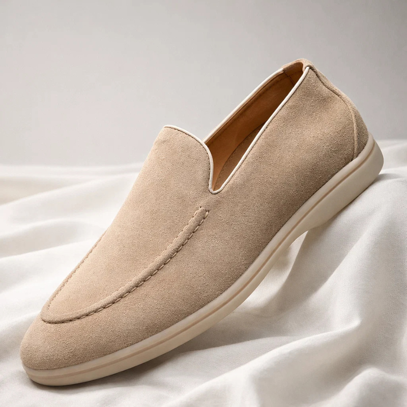 Classic black Mayfair men's slip-on loafers, versatile for casual or dressy occasions.