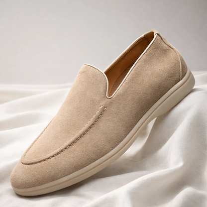Classic black Mayfair men's slip-on loafers, versatile for casual or dressy occasions.